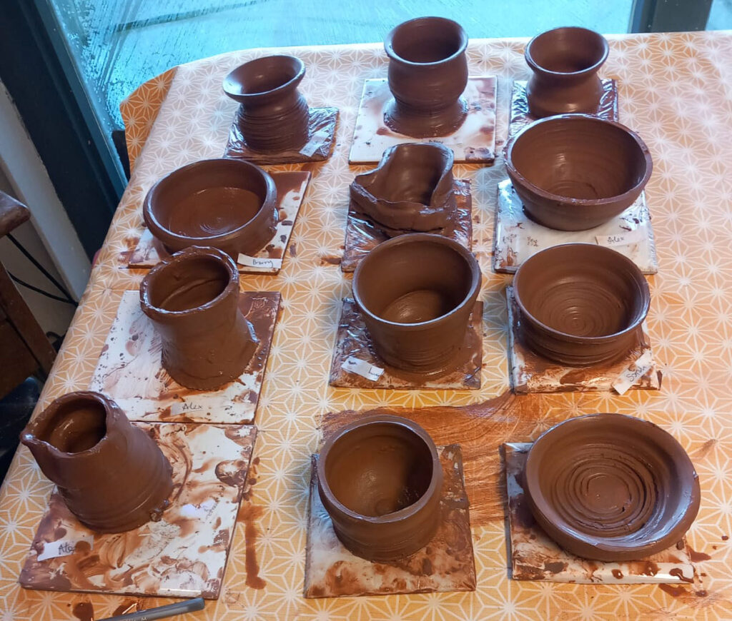 A selection of pots and plates made by Phil Anderson's family on a trip to St Ives